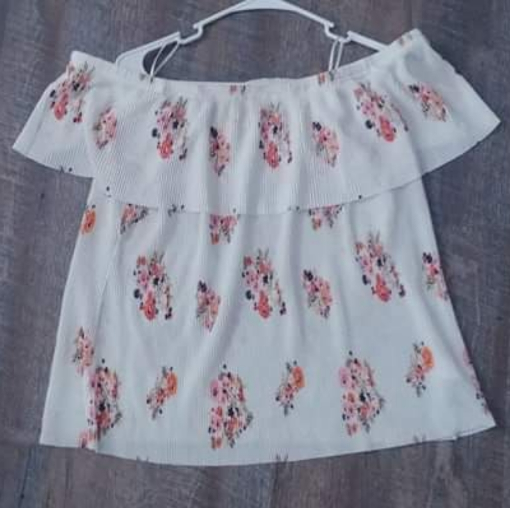 White flowered shoulder shirt plus shipping.